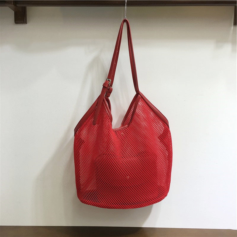 Hollow grid seaside leisure vacation shoulder bag