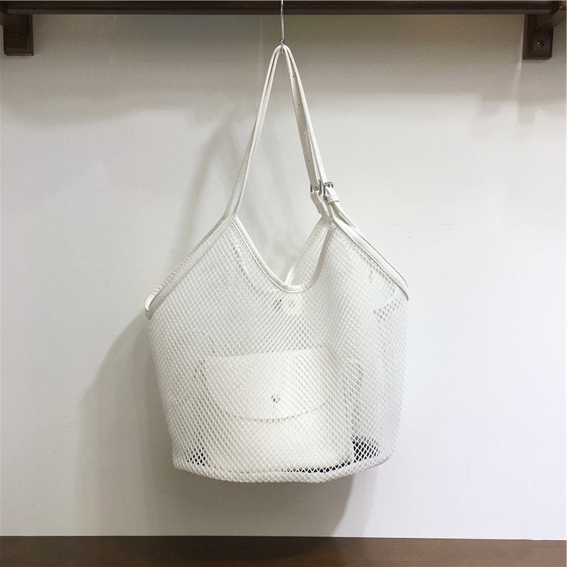 Hollow grid seaside leisure vacation shoulder bag