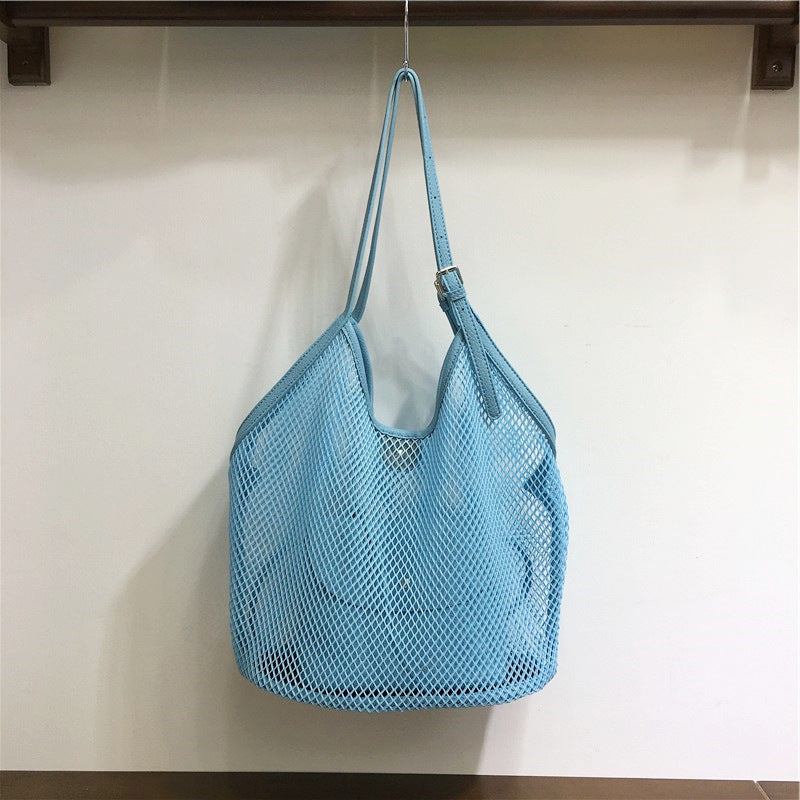 Hollow grid seaside leisure vacation shoulder bag